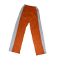 back of orange closed mesh pants whit side stripe